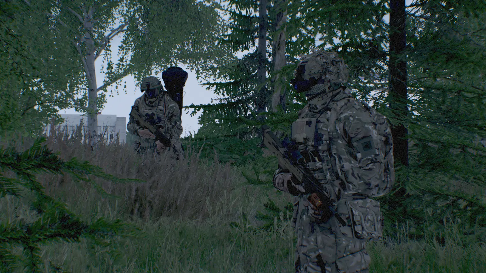 Patrol column moving through forest at dusk