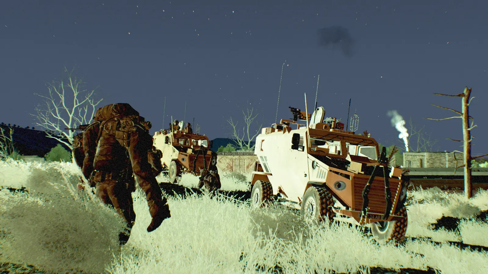Foxhound convoy on a night move, thermal-lit