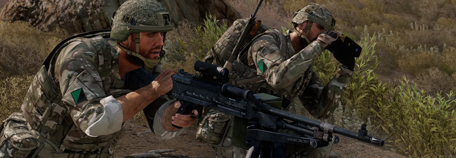 A GPMG gunner and spotter scanning from cover.