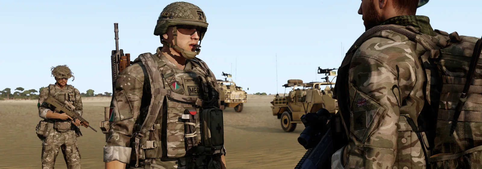 A medic and riflemen forming up ahead of a vehicle patrol.