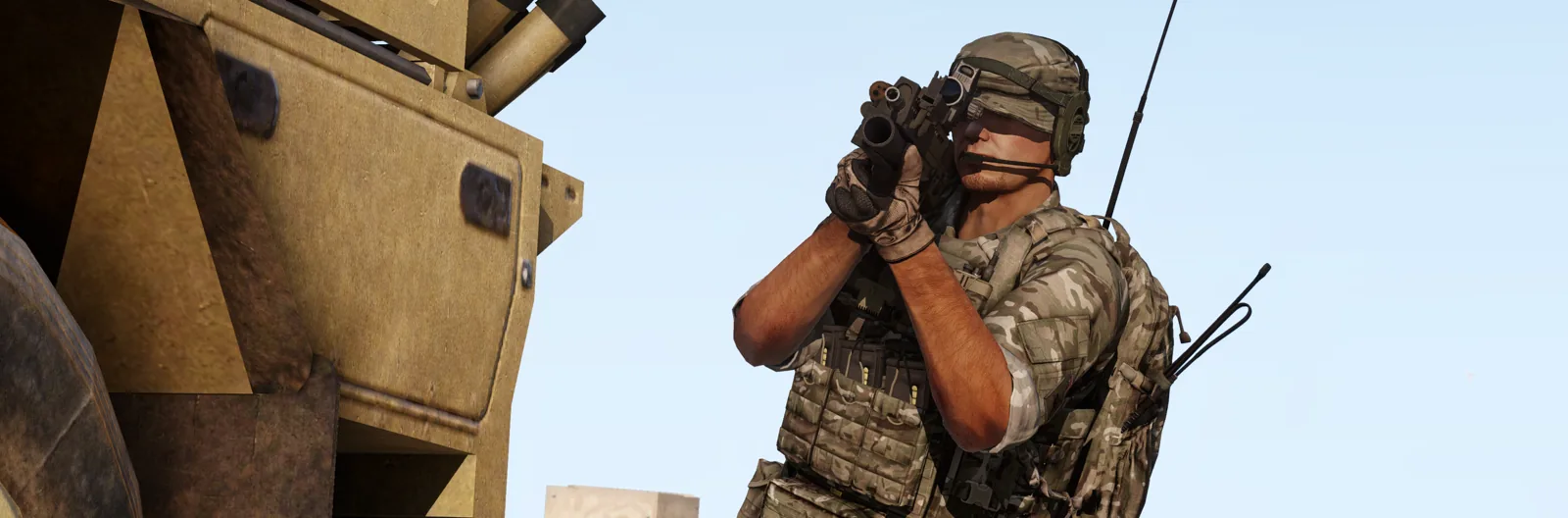 A rifleman aiming from a vehicle turret hatch.