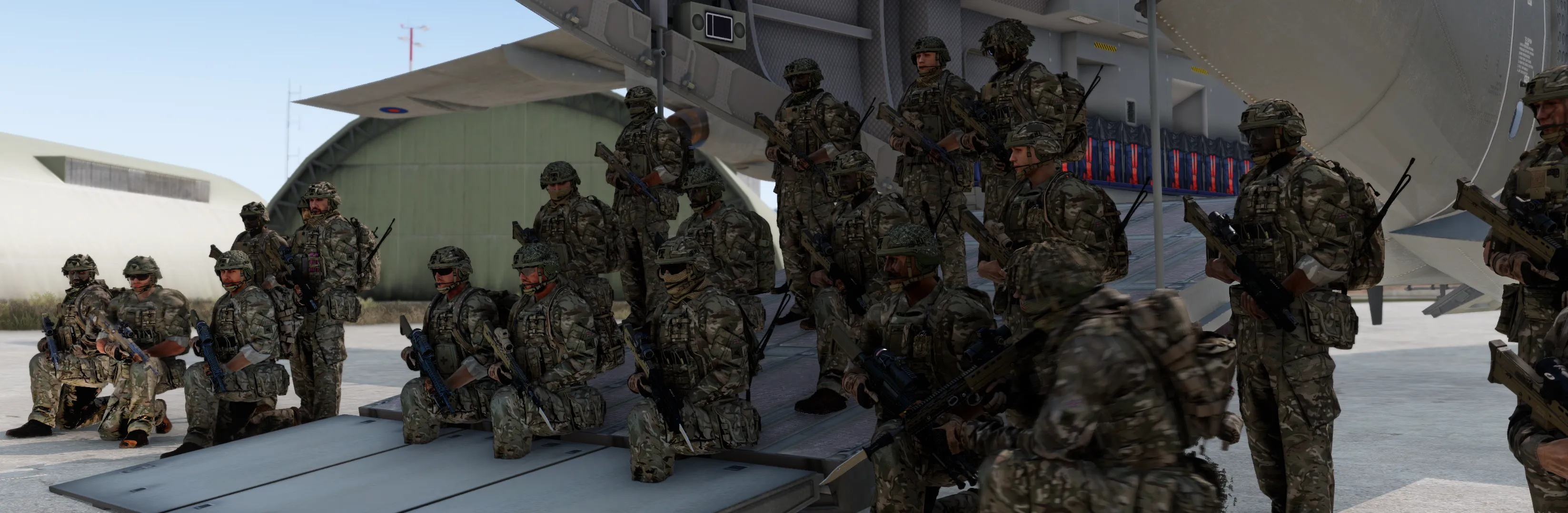 A platoon formed up in front of an A400M transport aircraft.