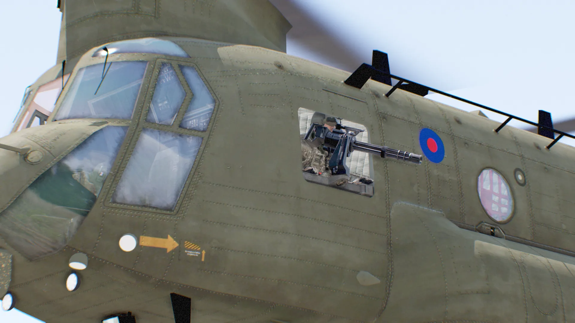 A door gunner aboard a JAC airframe.
