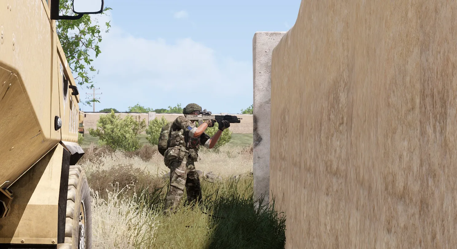 A rifleman peaking around cover during a clearance.