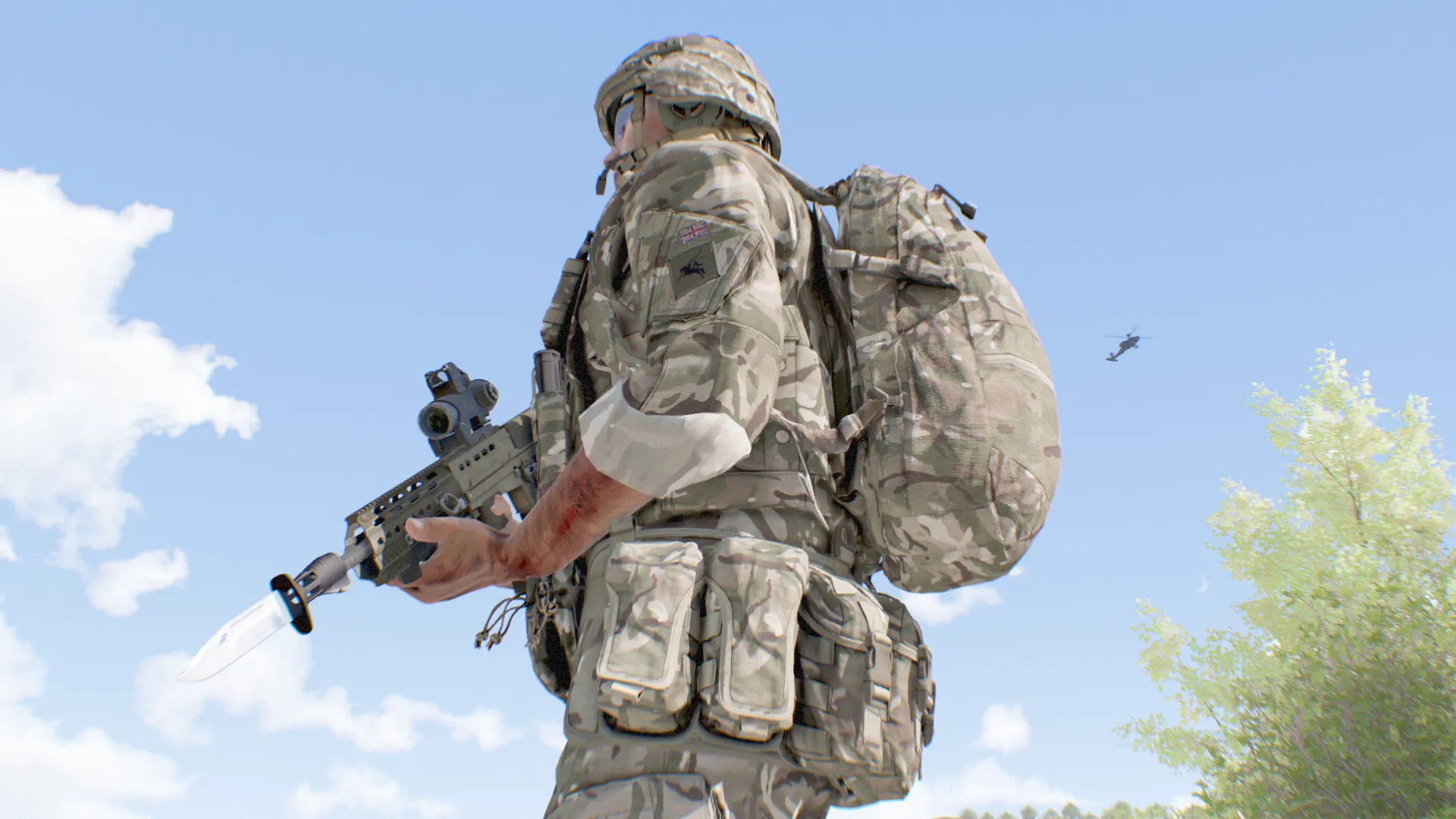 Ground troops working alongside an Apache overhead.